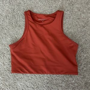 Red cropped tank with room to add pads